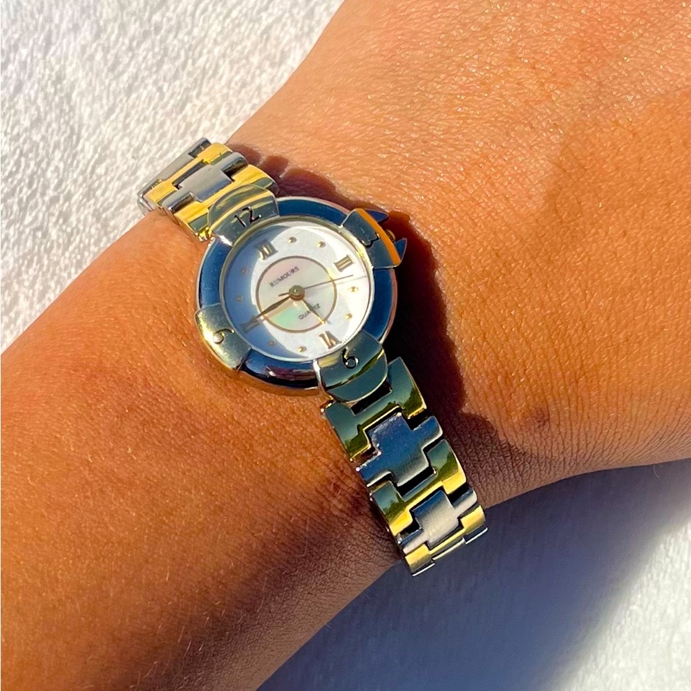 Vintage gold tone and silver tone rumours quartz women’s watch